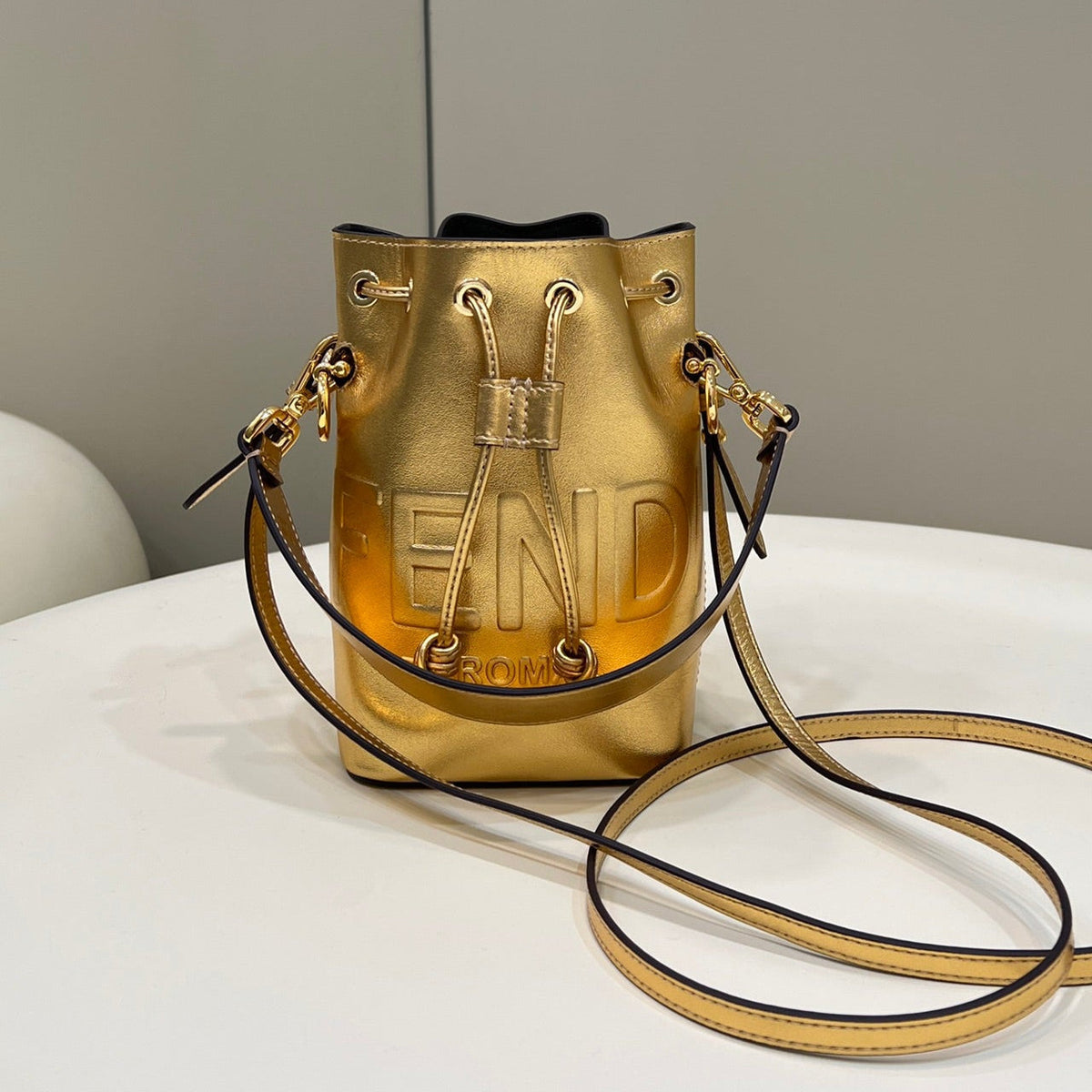 MON TRESOR 18 IN GOLD METALLIC CALFSKIN