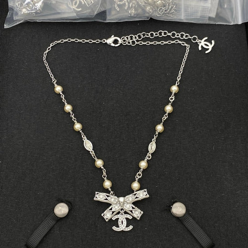 18K  Chanel Bow Tie Diamond Gold Necklace